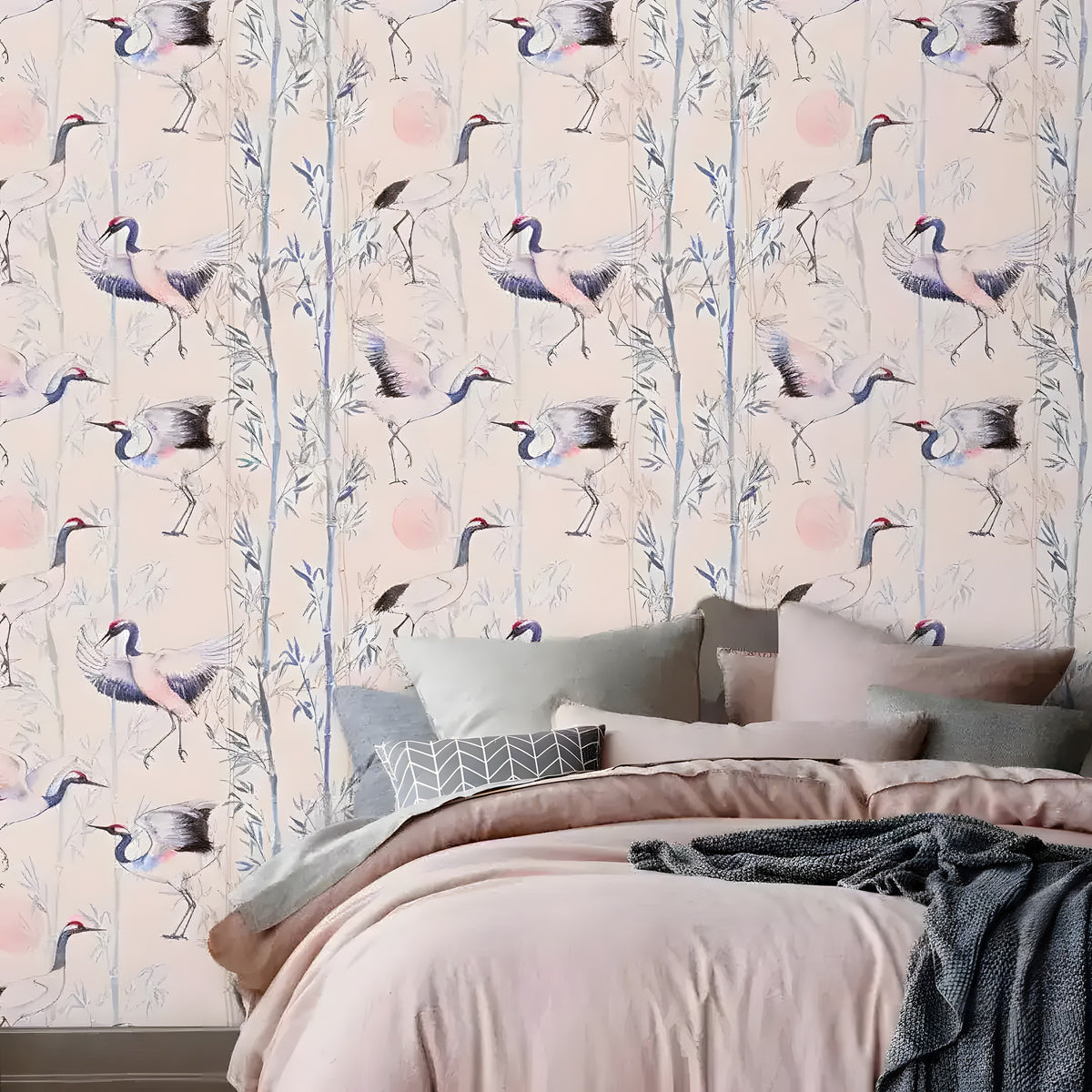 Birds of Paradise Pink Chinoiserie Wallpaper with dancing cranes and bamboo on blush ground, bedroom accent wall