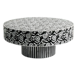 Round bone inlay coffee table with black and white floral top, daisy motif apron, and striped pedestal base