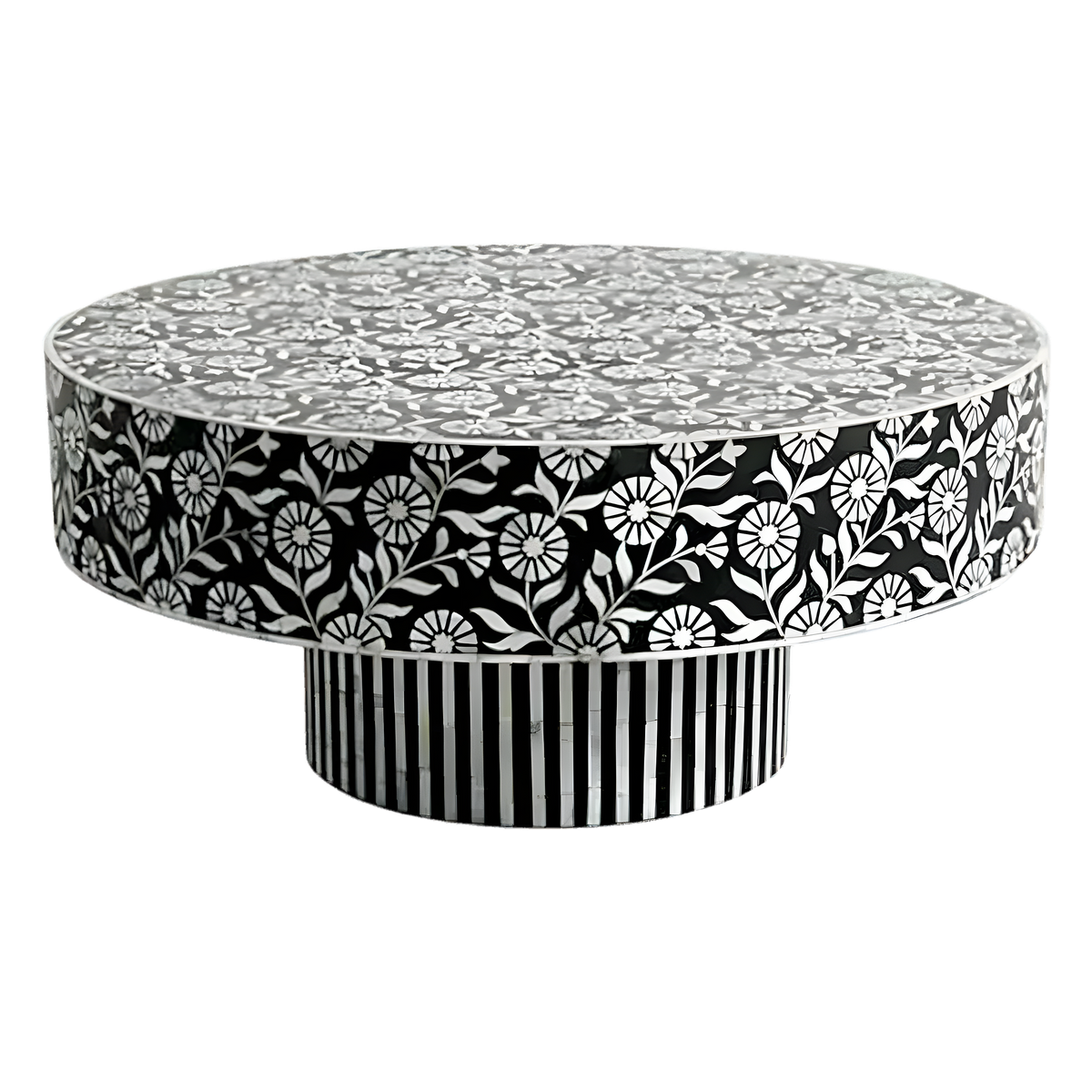Round bone inlay coffee table with black and white floral top, daisy motif apron, and striped pedestal base