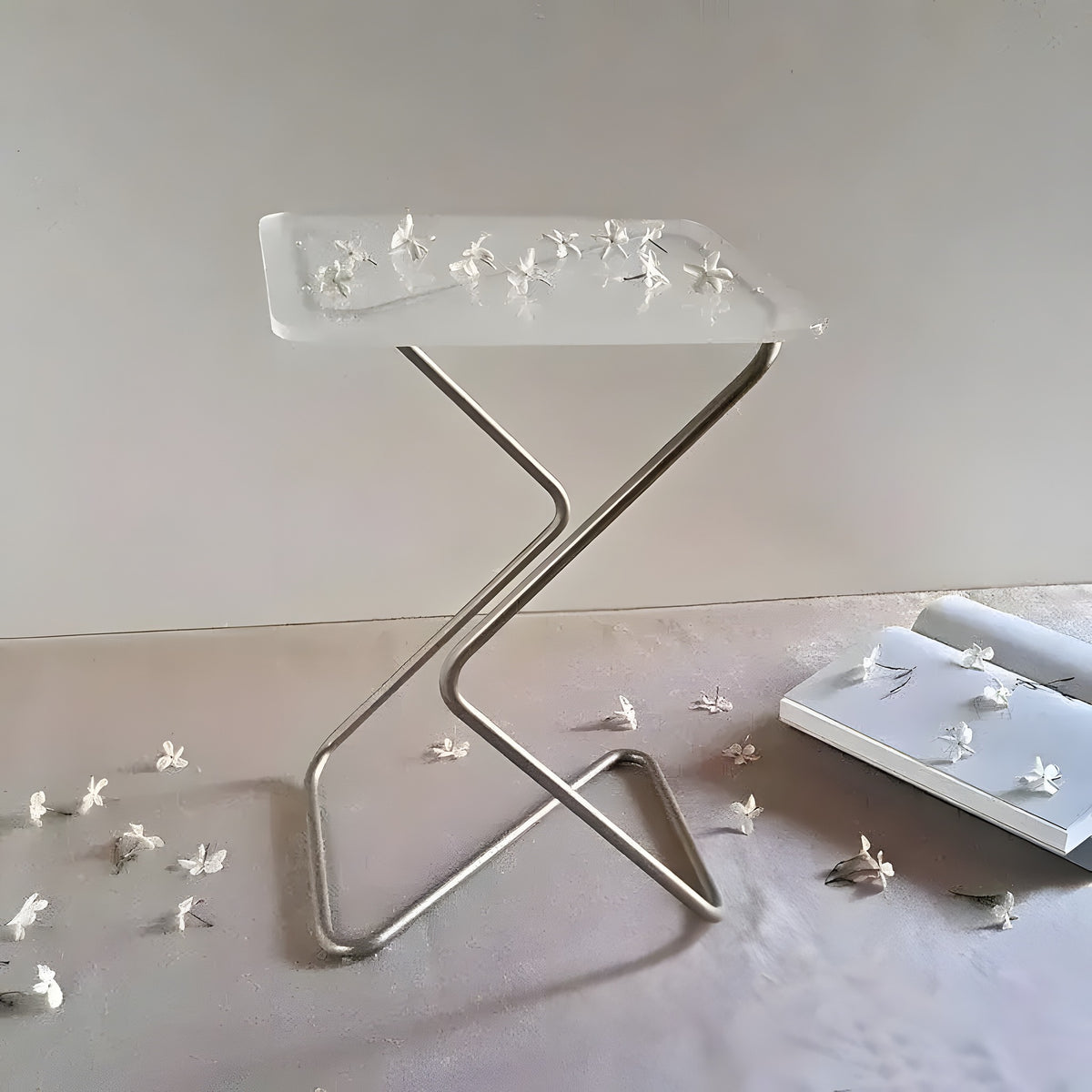 White Square Side Table with frosted resin top embedded with tiny flowers and X-shaped silver legs