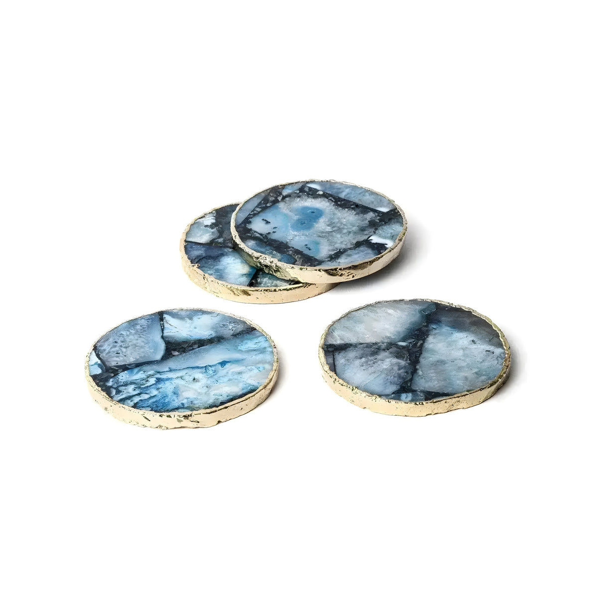Gold Trim Round Blue Agate Coasters set of 4 clustered showing varied blue-gray geode patterns with rough gold-trimmed edges