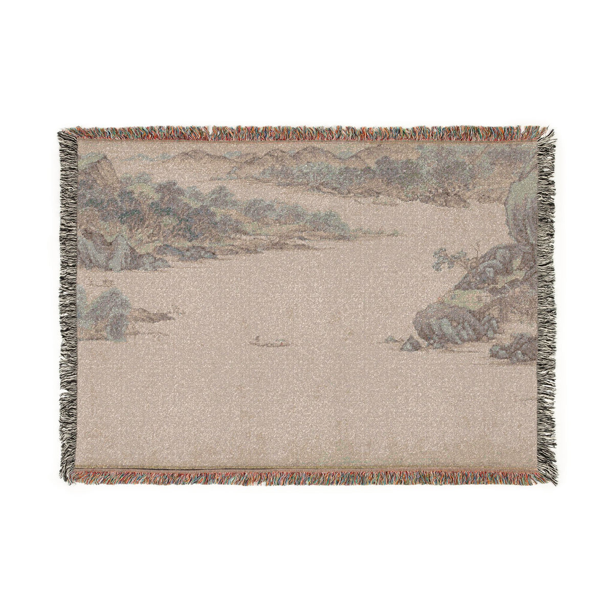 A rectangular woven throw blanket featuring a scenic landscape print in muted earth tones, finished with fringed edges on all sides, shown against a plain white background.