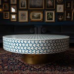 Blue Bone Inlay Brass Leg Round Coffee Table styled in a room setting