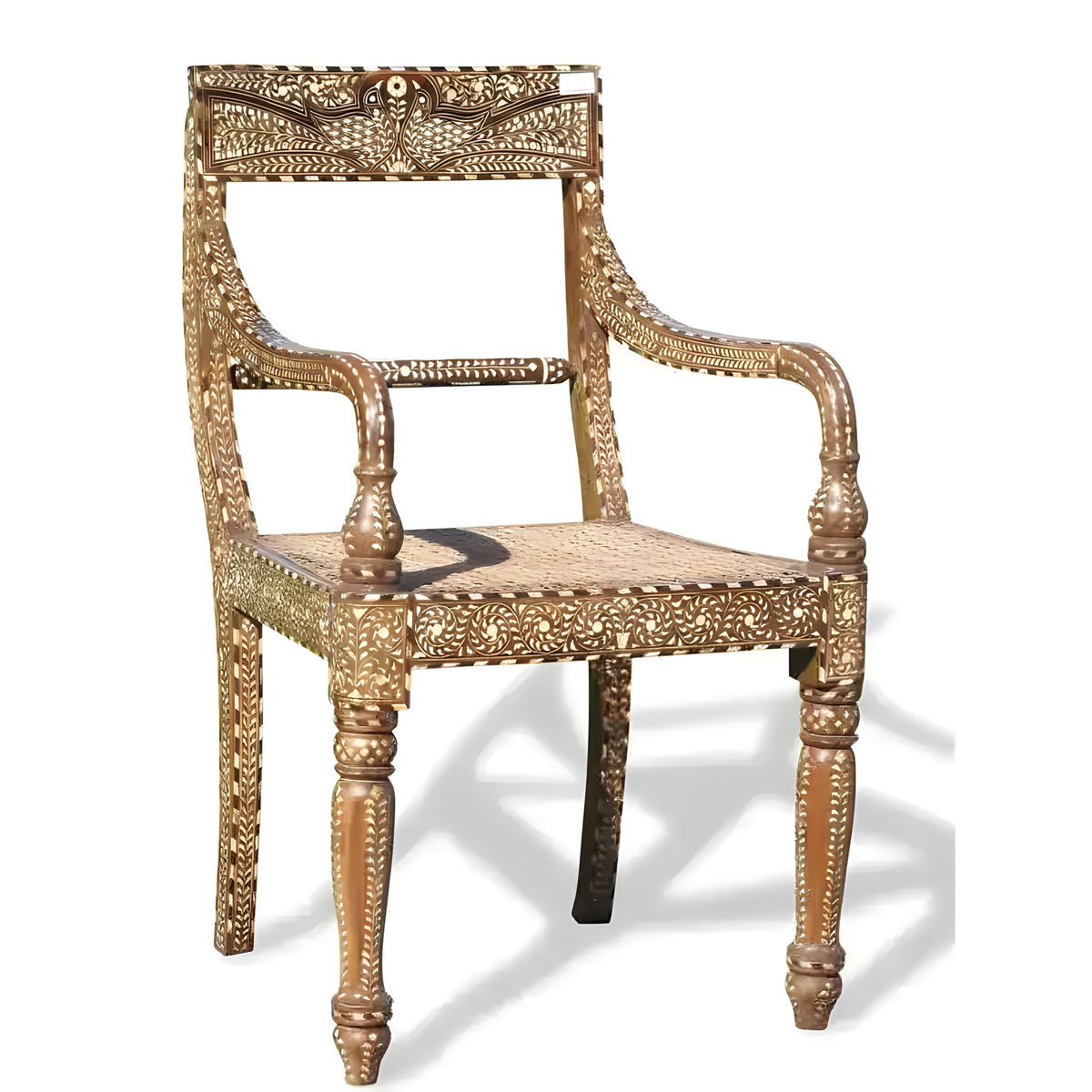 Teakwood bone inlaid chair with arms — full white shell-inlay floral on dark teakwood, caned seat, white background