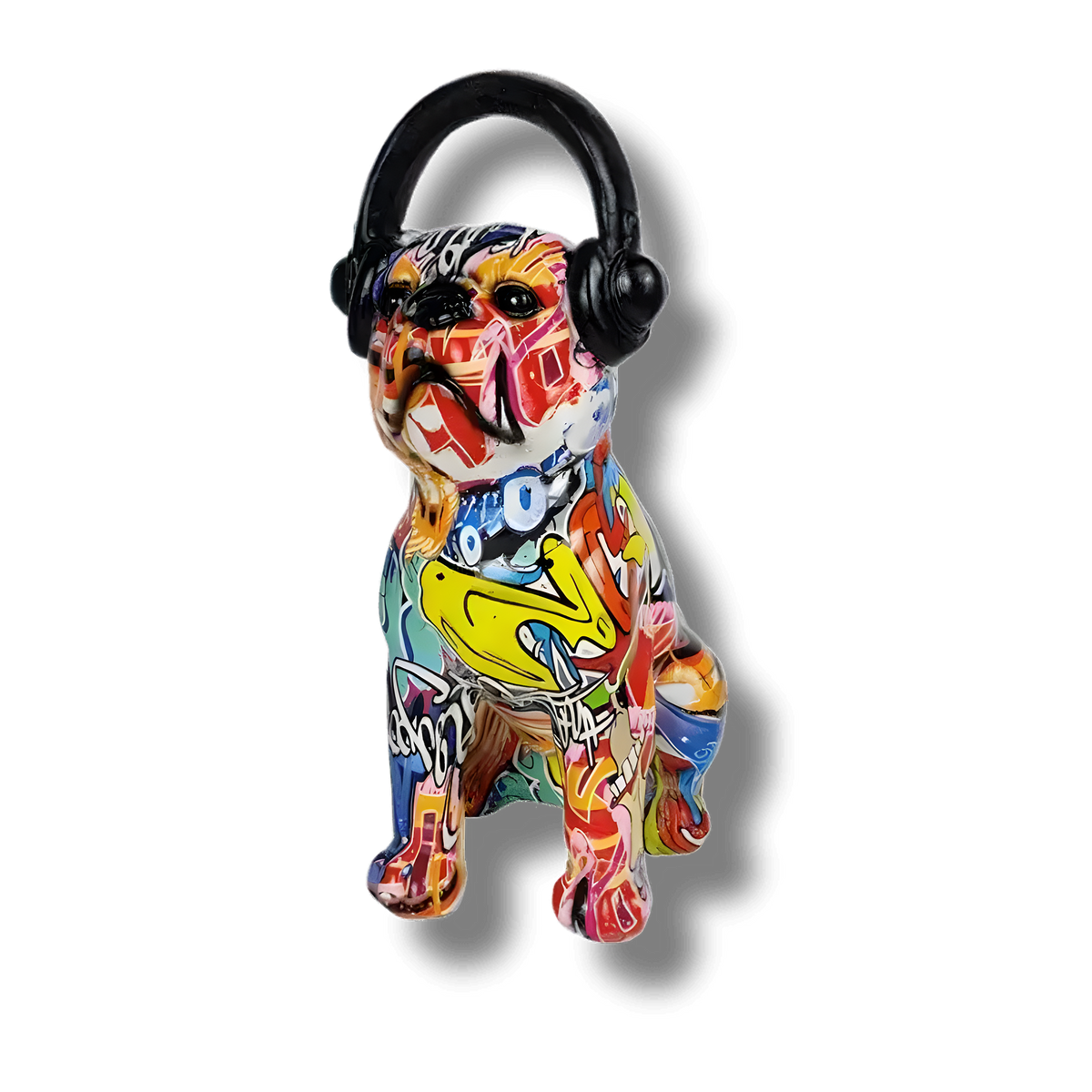 Bulldog pop sculpture with vibrant multicolor graffiti paint and black headphones, seated front view, white bg