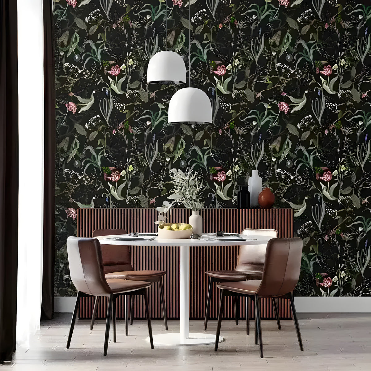 Green and black floral wallpaper in a dining room, dark botanical with green leaves and pink blooms, round white table