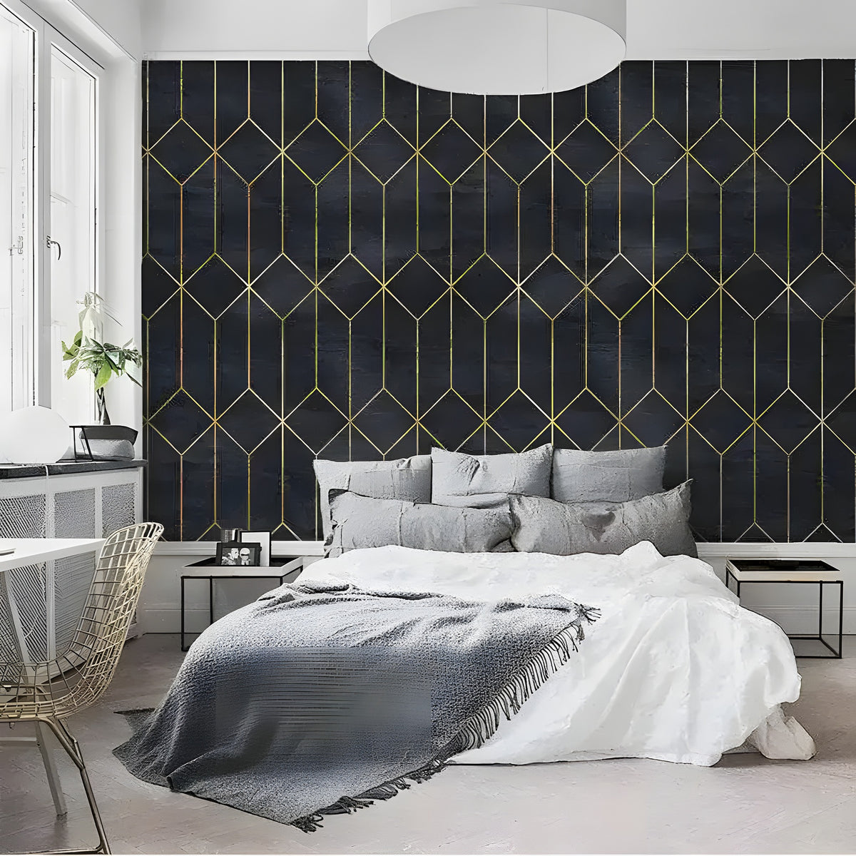 Black and gold art deco geometric wallpaper; black background with gold diamond lattice; white bed with gray bedding