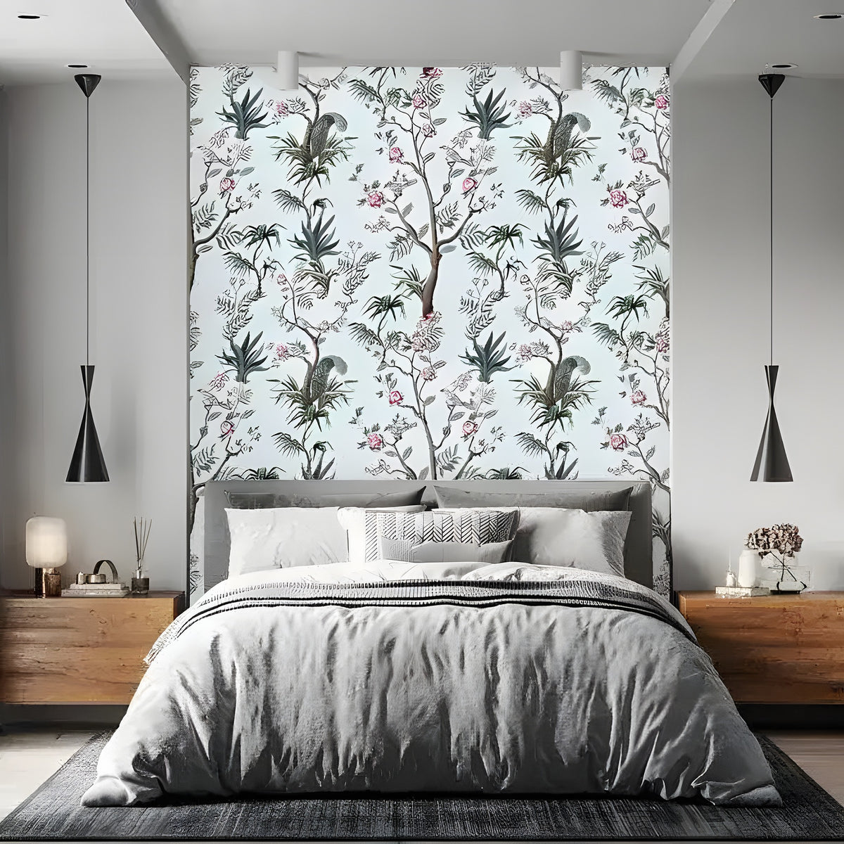 Chinoiserie wallpaper in bedroom, parrots and pink blossoms on pale branches, gray upholstered bed below