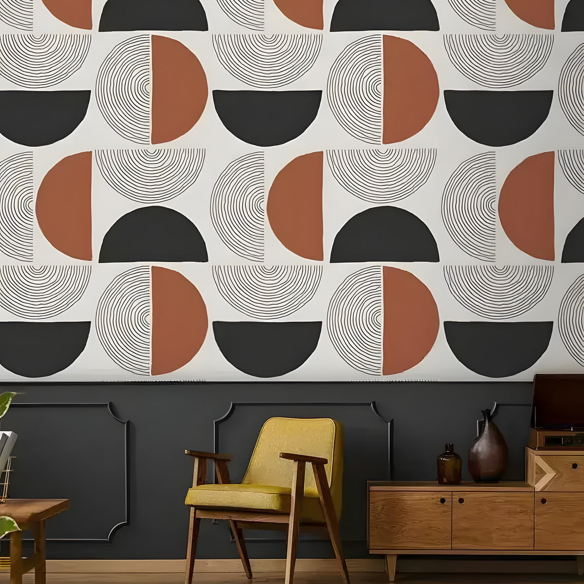Dark green wallpaper with brown botanical monstera, poppy and wildflower print; retro yellow chair, wood sideboard