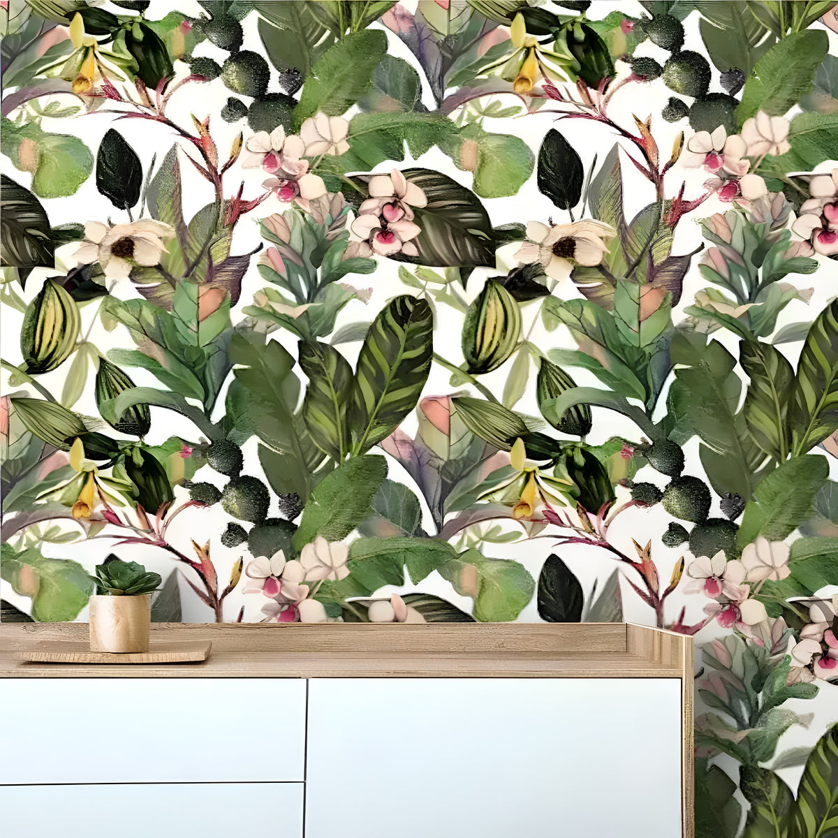 Green tropical leaves and flowers watercolor wallpaper with banana and calathea leaves and white orchids, behind a Scandi sideboard
