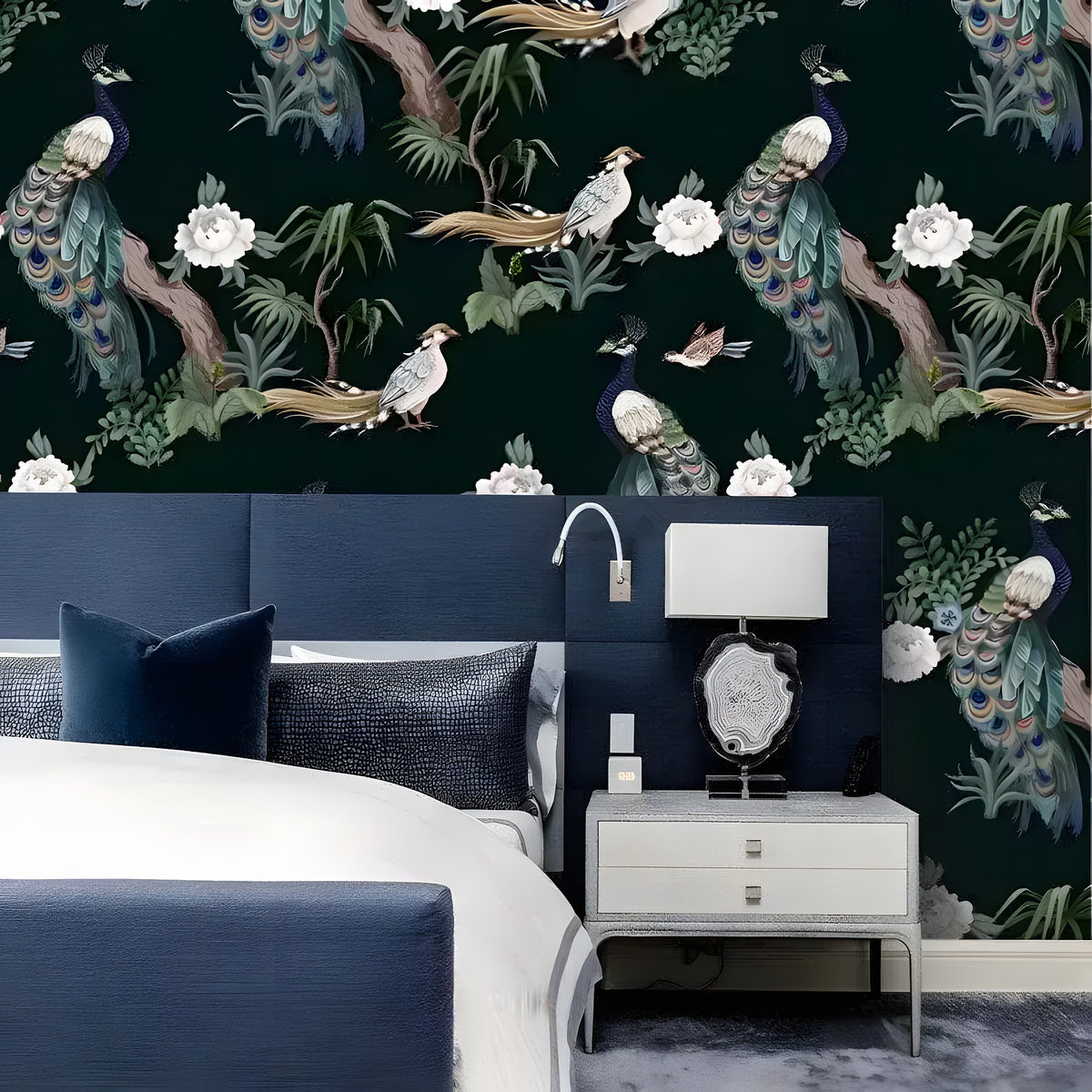 White wallpaper with green palm, banana leaves, leopards, monkeys and black parrot; wood and white sideboard below