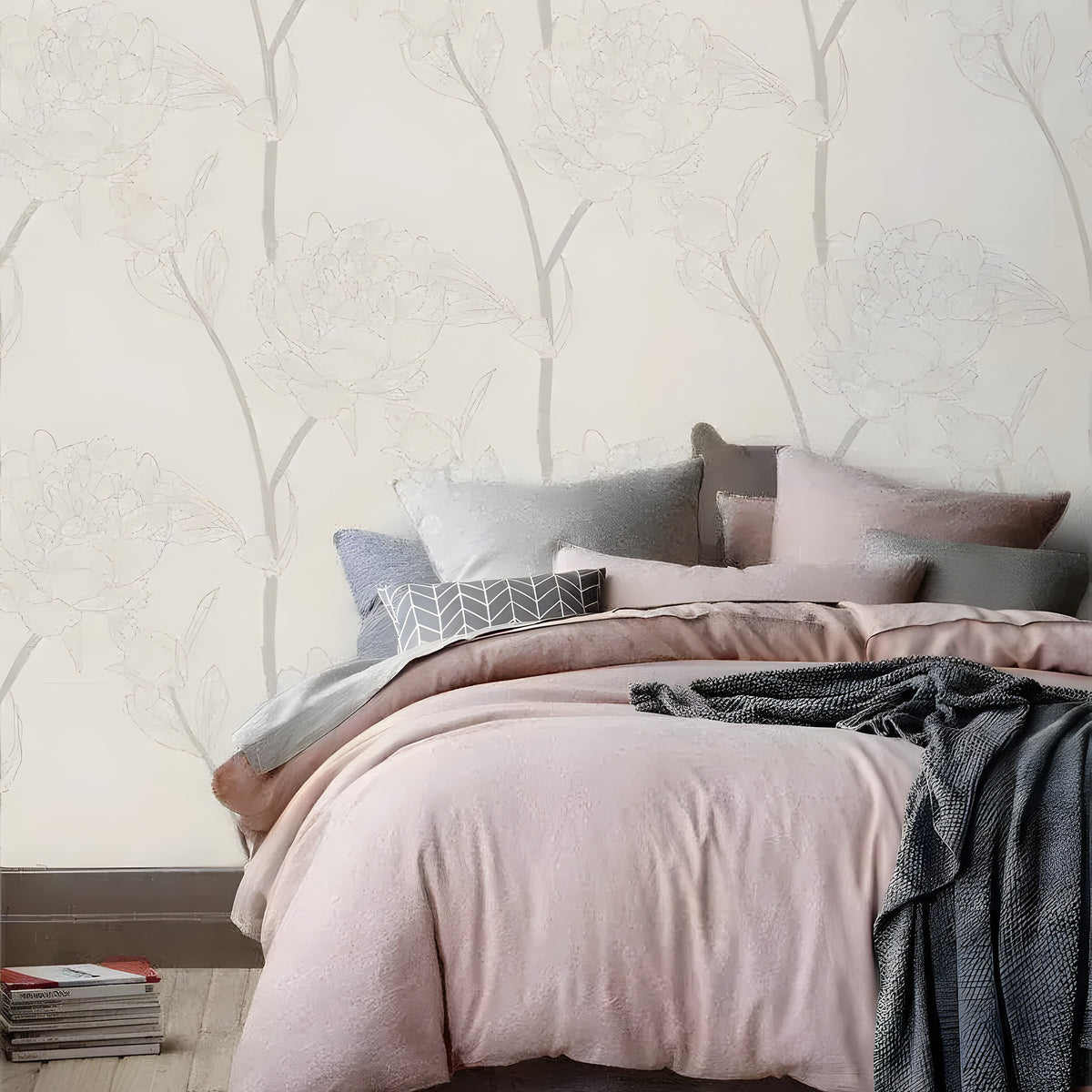 Bedroom setting with delicate flower wallpaper showing gray outline blooms on cream, pink bedding on bed