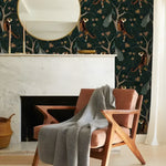 Tropical tigers in the dark wild wallpaper installed in a room, bold dark jungle with prowling tiger and tropical foliage