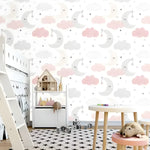 Moons and clouds nursery wallpaper in child's room with pink and gray pattern, dollhouse