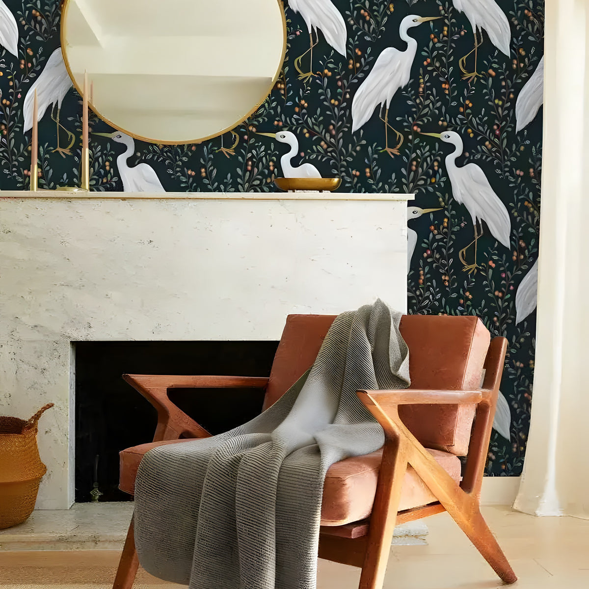 Black and white crane chinoiserie wallpaper in a styled room with natural light and soft furnishings