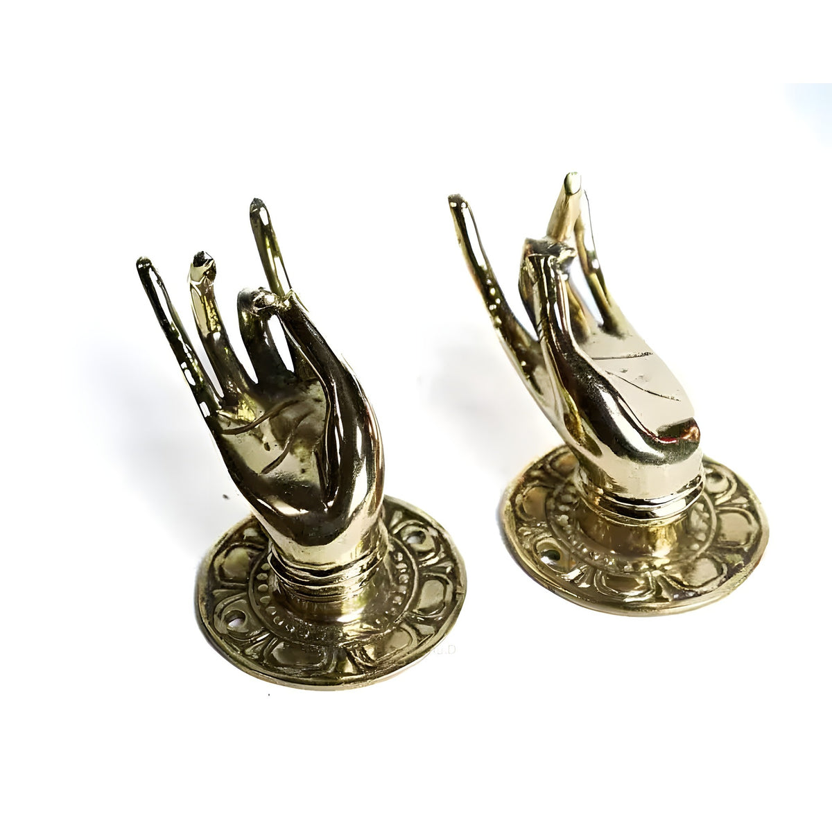 Pair of polished brass Buddha hand door handles in Shuni mudra pose on ornate round back plates