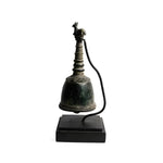 Solid brass Genta bell on black display stand, antiqued dome, Nandi bull finial, cord clapper, white bg