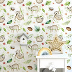 Cute baby sloth kids room wallpaper on full wall, watercolor sloths on branches with tropical leaves and flowers