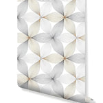 Rolled wallpaper with geometric floral linear petal pattern in silver-gray and gold on white