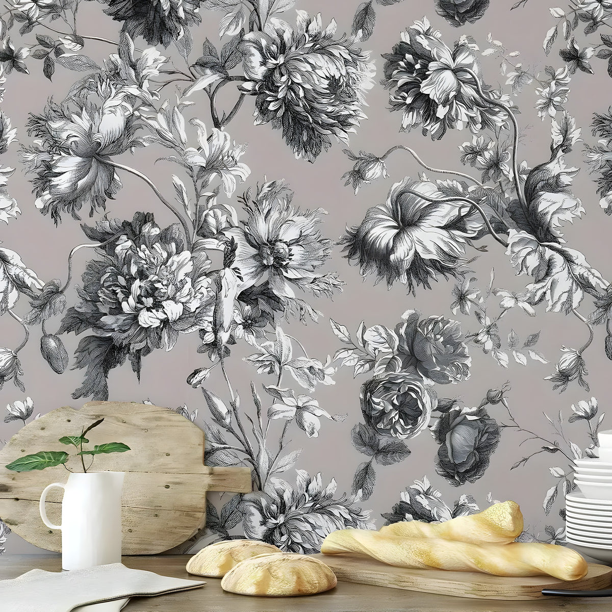 French toile vintage floral wallpaper in a rustic kitchen with bread, boards, and pitcher