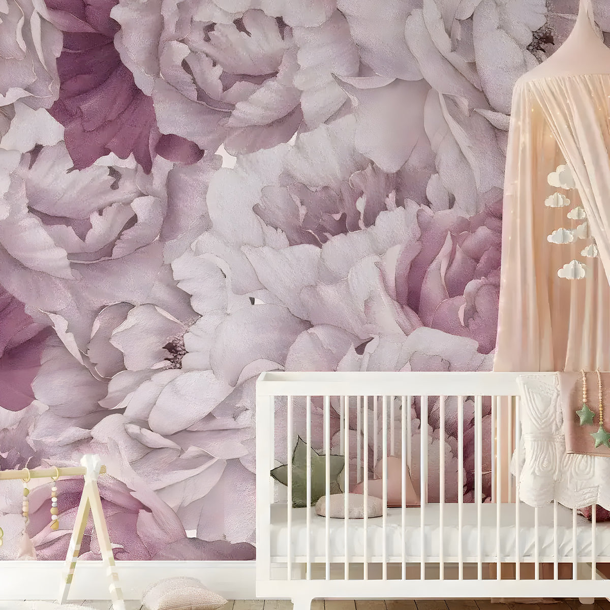 Watercolor pink peonies wall mural in a nursery behind a white crib with a peach canopy, oversized mauve blooms