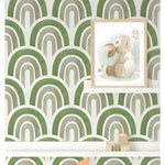 Green waves boho wallpaper in a nursery with bunny art print and colorful bunting banner