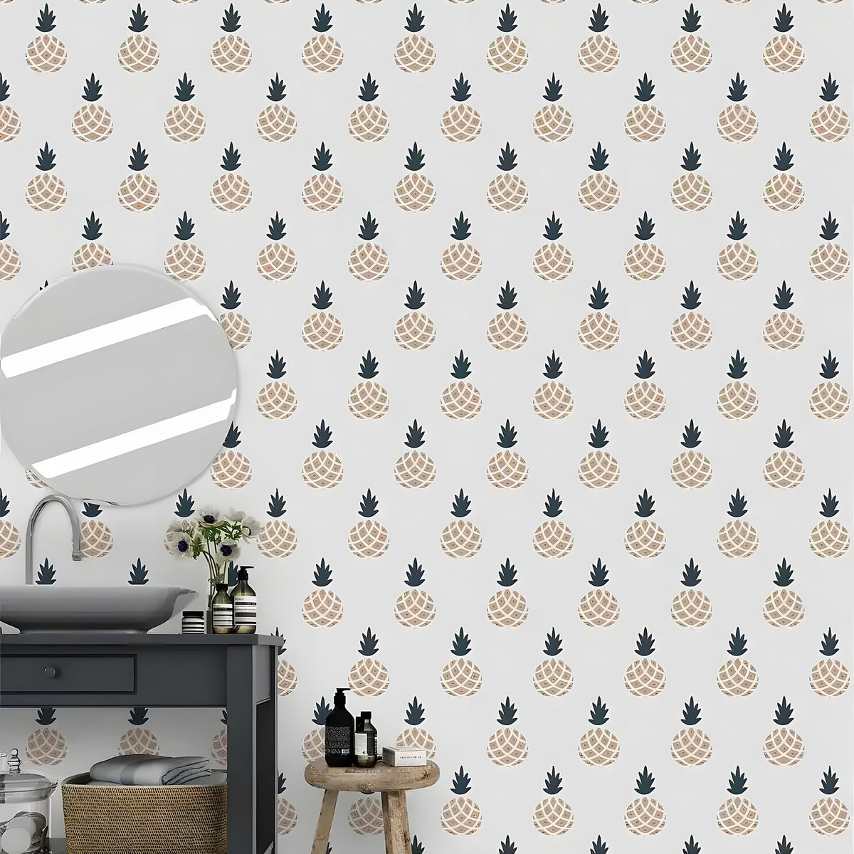 Minimalistic pineapple wallpaper in a bathroom beside a dark vanity and circular mirror