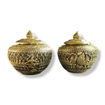 Pair of Ramayana brass betel boxes with lotus bud lids showing epic scene engravings on rounded belly