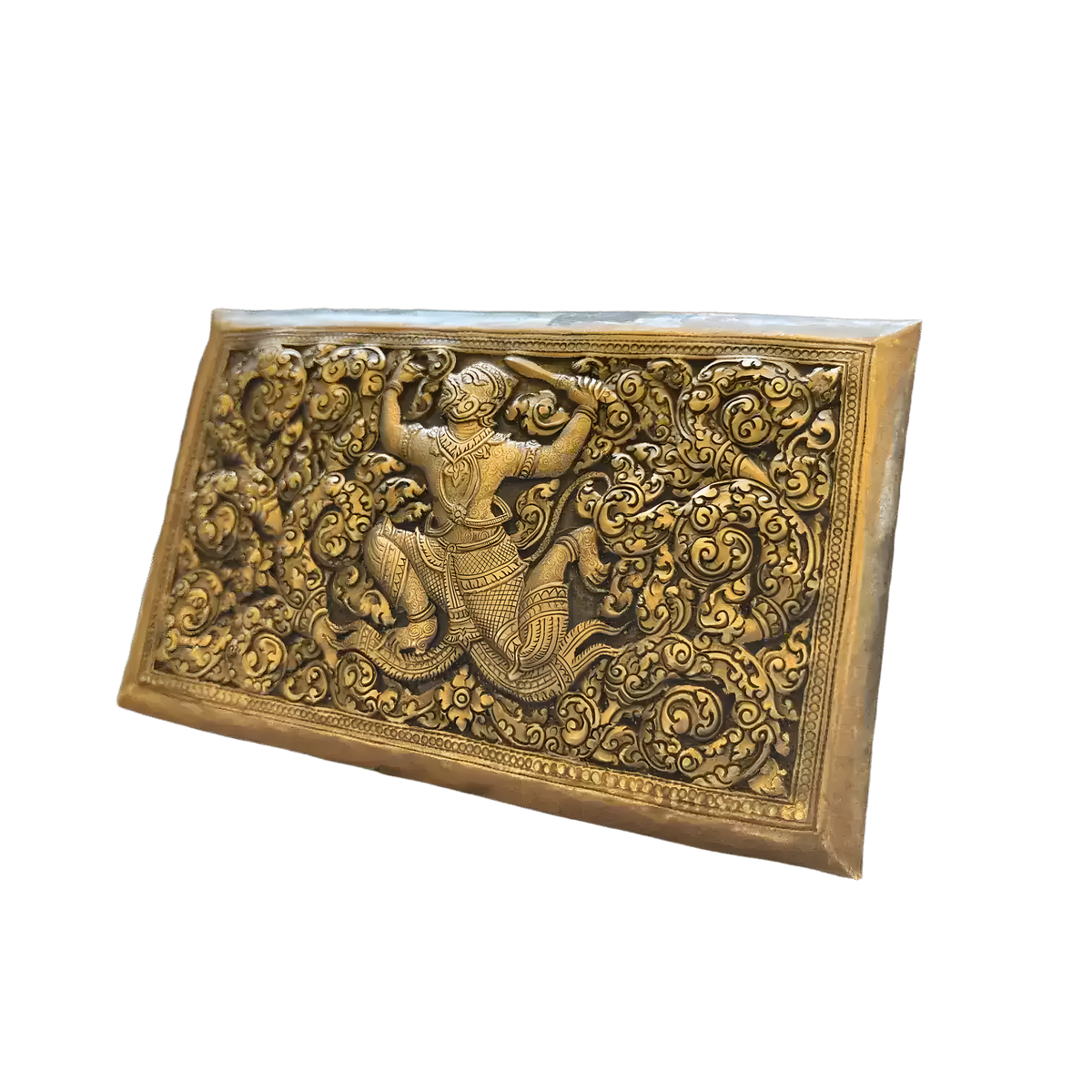 Angled view of rectangular brass niello Hanuman betel box lid, raised warrior figure in golden swirling scrollwork
