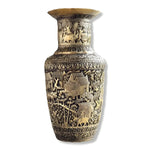 Brass niello flower vase with engraved Khmer village scenes — elephants, huts, palms on aged gold surface