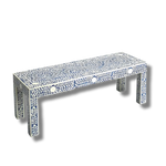White and blue floral bone inlay bench, angled view, white botanical vine-and-flower pattern on navy blue ground over all surfaces