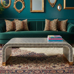 Black and White Stripe Waterfall Bone Inlay Coffee Table with Brass Leg styled in a room setting
