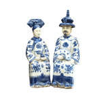 Pair of Qing dynasty sitting emperor and empress hand-painted ceramic figurines in blue and white dragon robes, front view