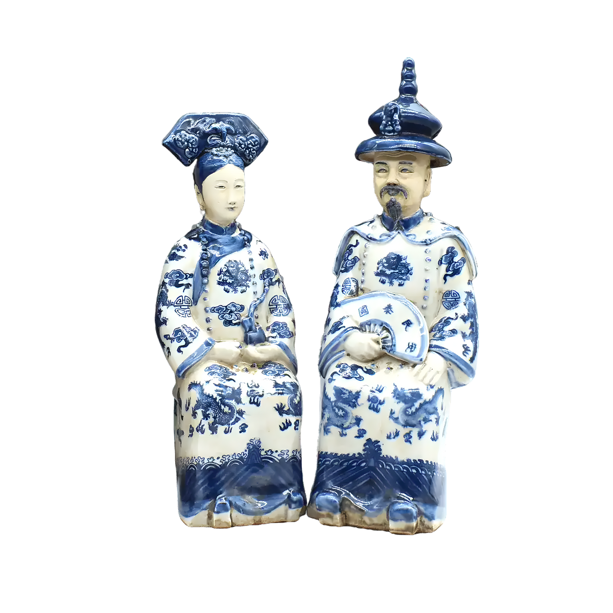 Pair of Qing dynasty sitting emperor and empress hand-painted ceramic figurines in blue and white dragon robes, front view