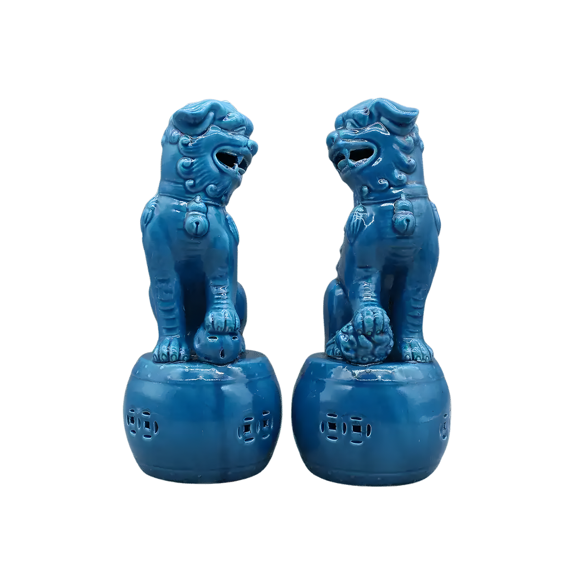 Pair of cerulean blue ceramic foo dog lion sculptures seated on round perforated drum bases, front view, light grey background