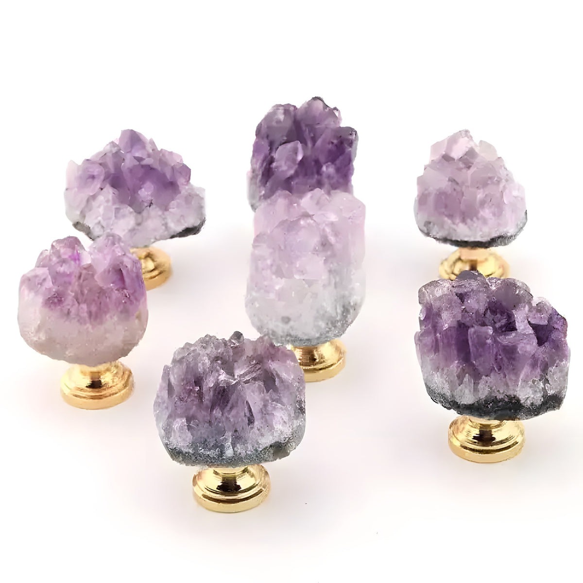 Six natural amethyst crystal cluster drawer knobs on polished gold bases from multiple angles on white