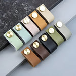 Leather cabinet drawer knob set in mint, pink, tan, olive, black and brown with brass round studs on dark stone