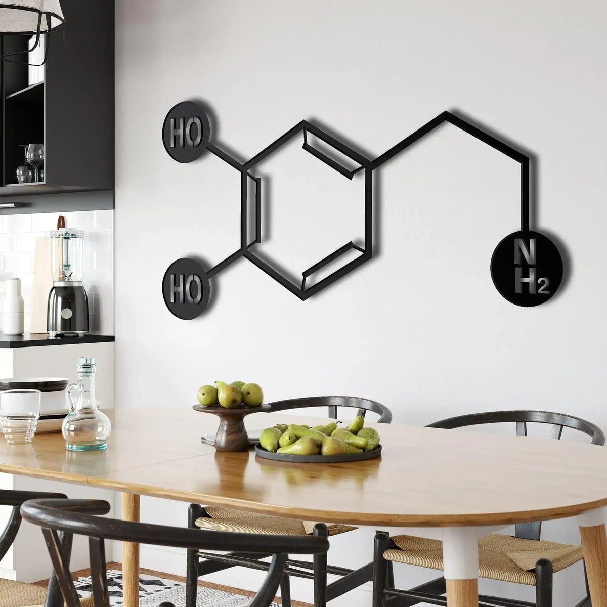 Black Dopamine Molecule metal wall art with HO/NH2 labels above wooden dining table, black chairs