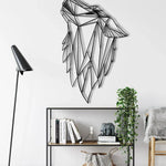 Black geometric wolf head metal wall decor howling, angular facets, on white wall with shelf and lamp