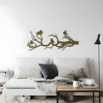 Birds on Branch Metal Wall Decor in gold finish, perched songbirds on white wall above entryway console