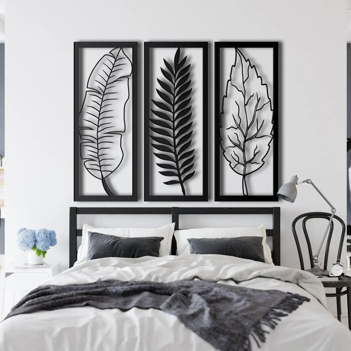 3 Panel Leaves Metal Wall Hanging black, banana leaf fern and maple triptych above bed headboard