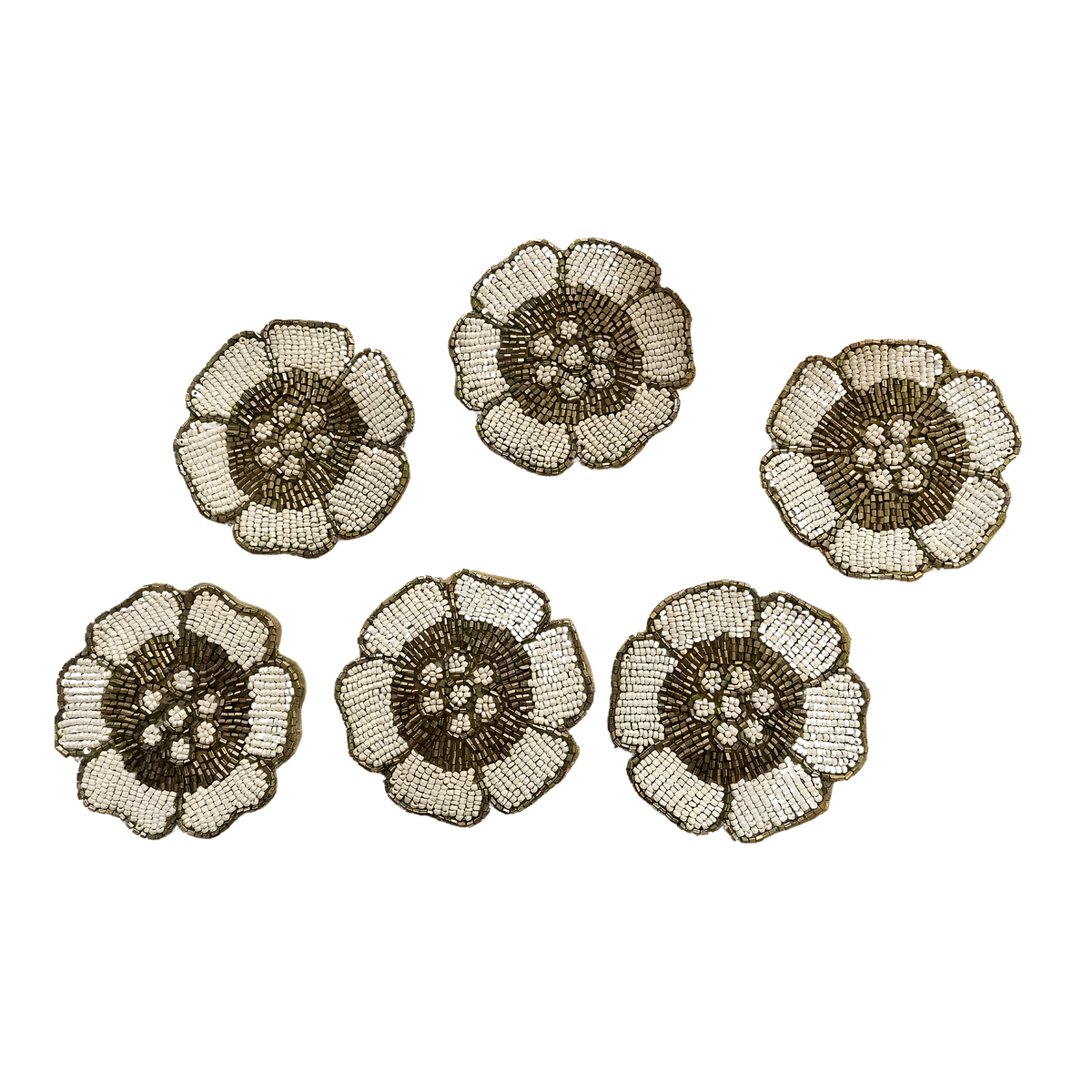 Set of six white and gold flower-shaped beaded coasters arranged on white background, front product view
