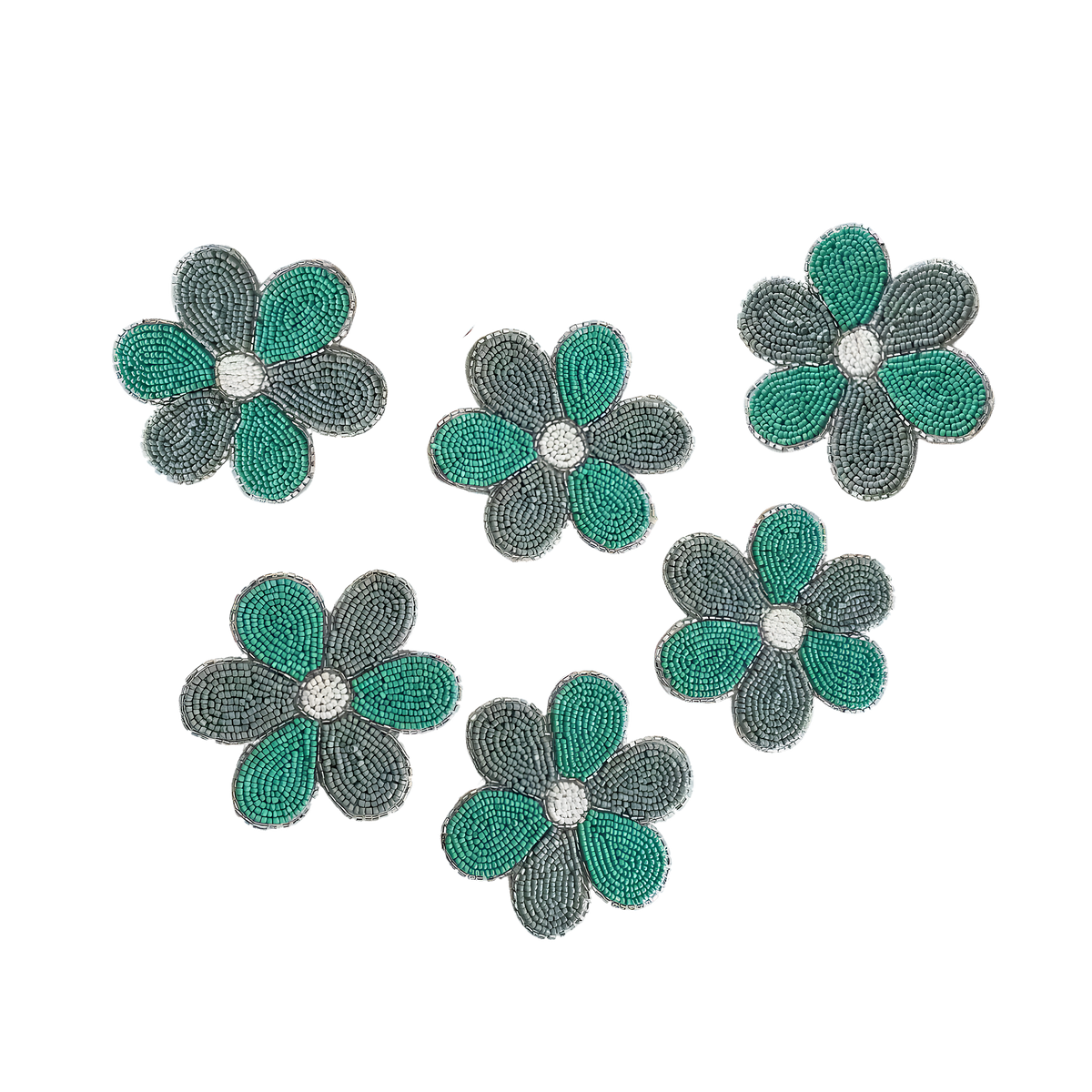 Set of 6 turquoise and grey beaded flower-shaped coasters with white center on white background