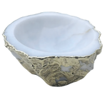 White agate geode jewelry bowl with smooth white interior and rough gold-plated exterior, irregular geode shape