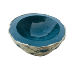 Teal blue green agate geode jewelry bowl with gold plated rough exterior, hollow interior visible, side view on white