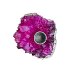 Pink agate taper candle holder overhead view, vivid magenta druzy crystal cluster with silver-plated edge and round metal socket