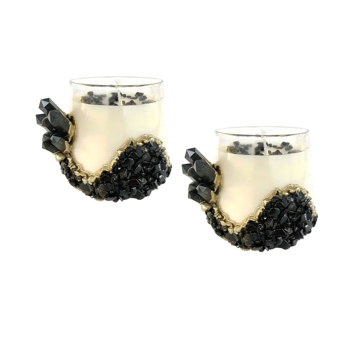 Two clear glass mugs filled with cream soy wax, each decorated with black agate crystal clusters and chips, front view