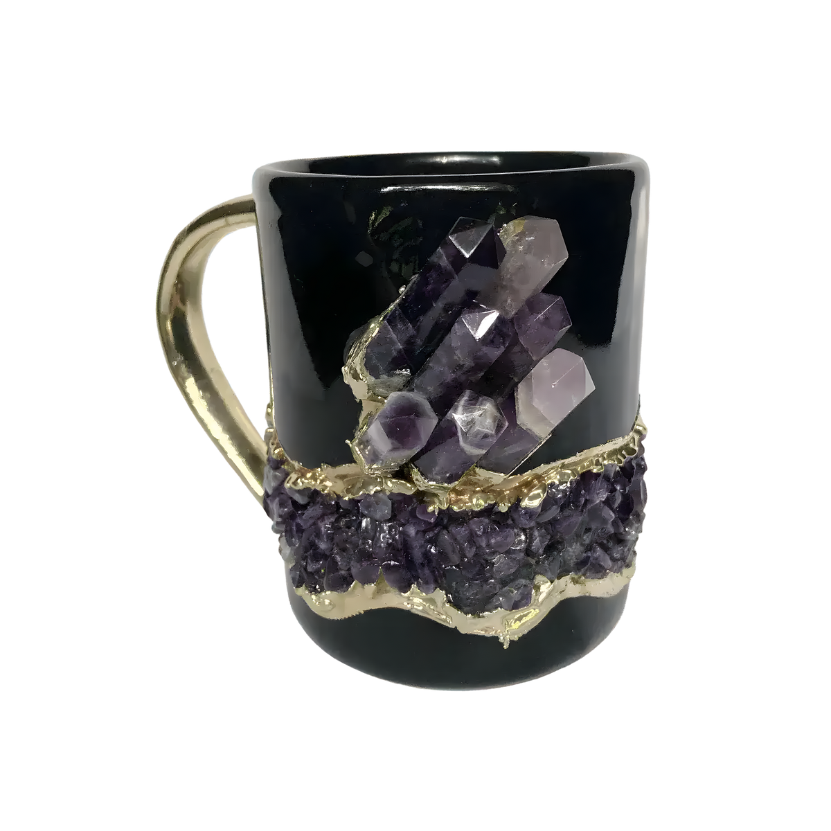 Black ceramic mug with gold handle, large purple amethyst crystal spires above a band of amethyst druzy with gold trim, front view