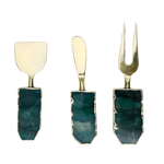 Set of 3 green agate cheese knives with gold blades and dark green agate slab handles, displayed upright against grey background