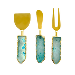 Set of 3 aqua agate cheese knives with gold blades, translucent blue-green agate handles trimmed in gold, displayed vertically